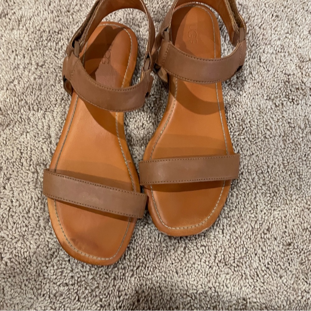 UGG sandals, brown leather, slightly worn. Little bit of peeling*